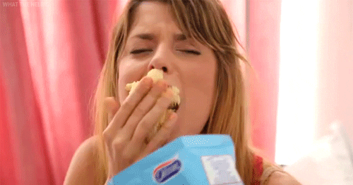 girl stuffing her face with chips